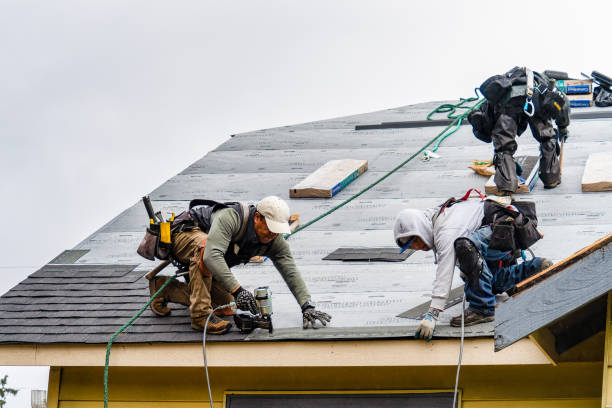 Professional Gutter Installation technician working in Hempstead, NY